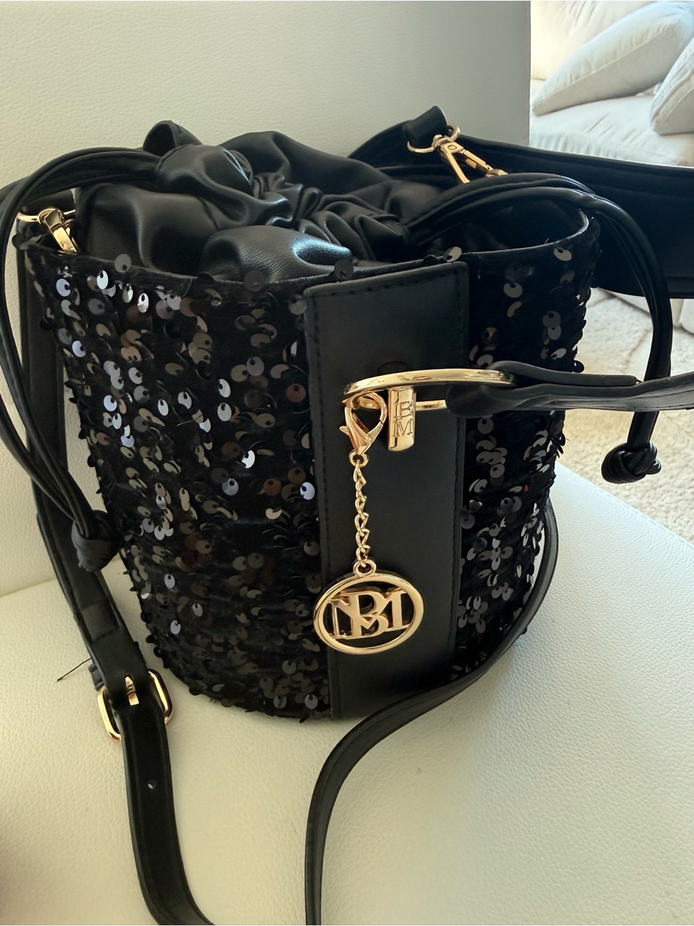 Badgley Mischka Black Sequin Drawstring Bucket Bag with Gold Charm